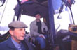 Father and son. Steven Waters in the cab is about to go out to bring the cows in for milking
